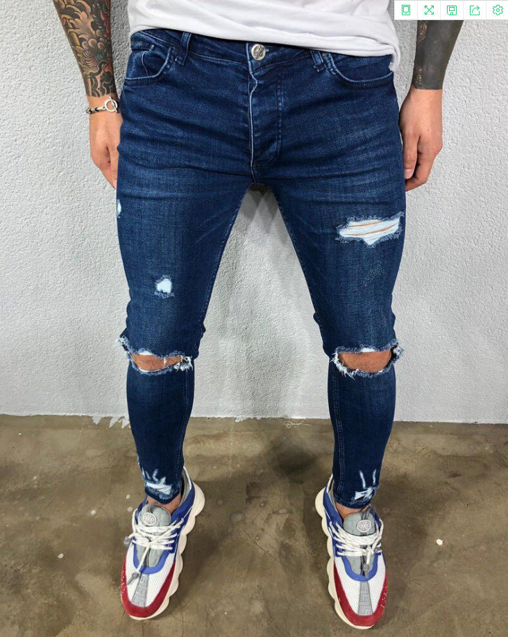 KNEE HOLE RIPPED JEANS